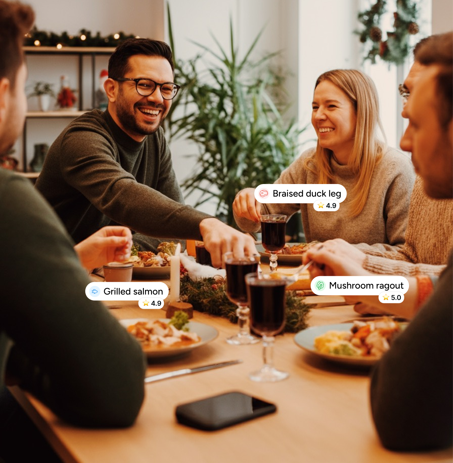 Colleagues sharing a festive Christmas dinner with seasonal menus and drinks